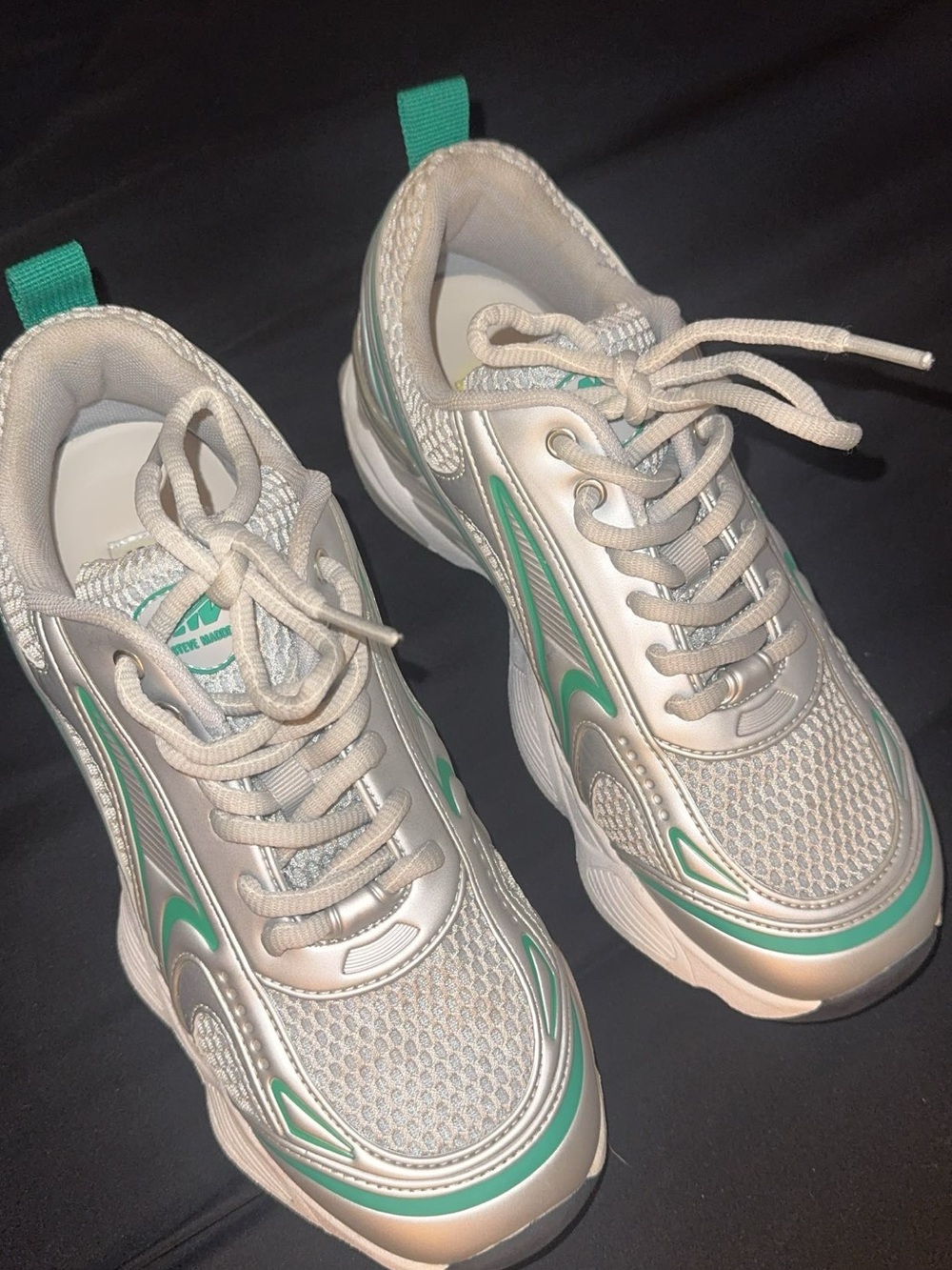 Steve Madden Cream Sneakers with Teal Accents